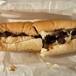 Steak Tip, Onions, Peppers & Cheese Sub