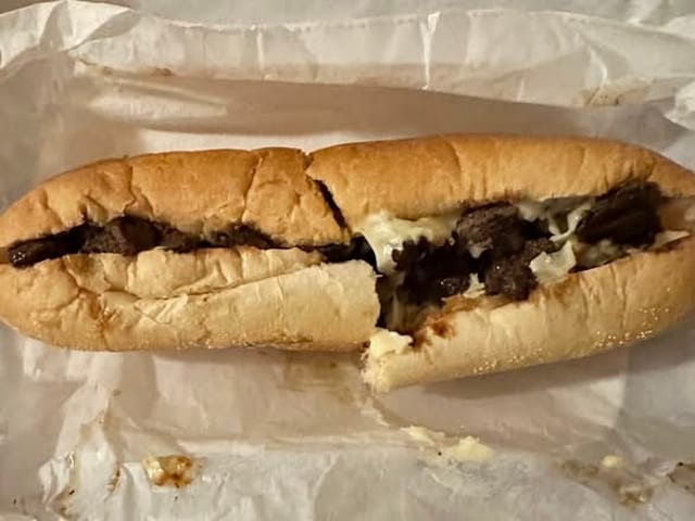 Steak Tip, Onions, Peppers & Cheese Sub.